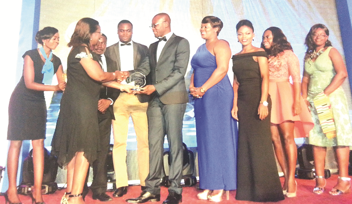  Representatives of Coconut Grove Beach Resort receiving their award